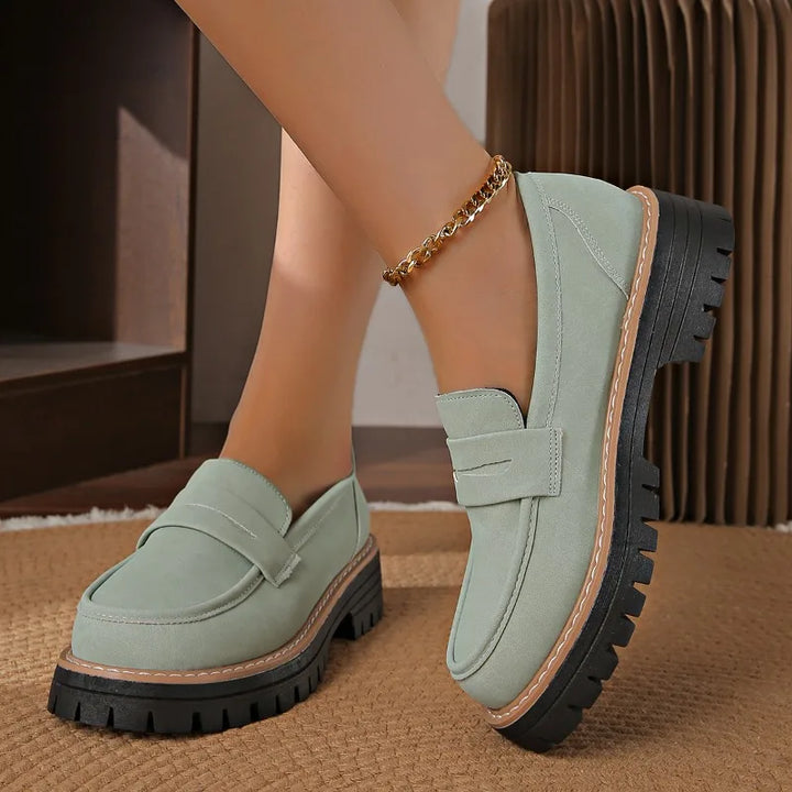 Savira women's platform loafers in close-up, showcasing their soft cushioning and sleek design.
