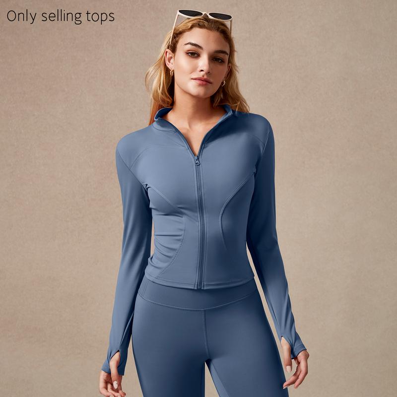 Long sleeve women's zip-up workout top. Ideal for gym, sport, & active lifestyle. Performance apparel.