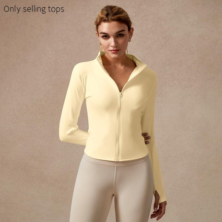 Modern women's performance zip top. Long sleeve activewear for gym, sport, & intense workouts.