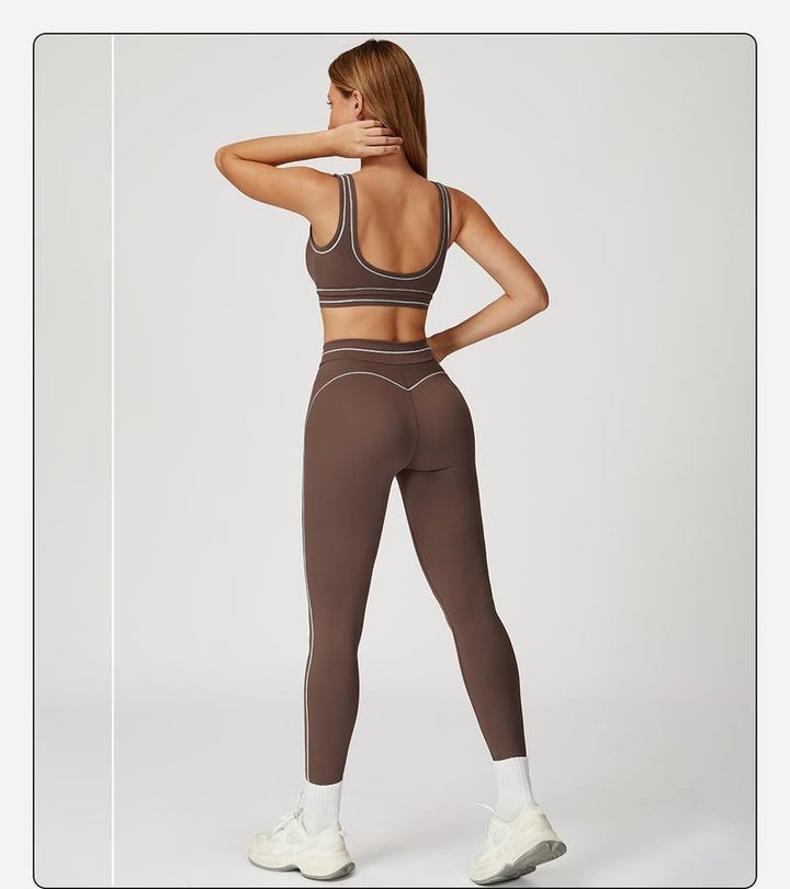 Fitness-ready women's two-piece set: sculpting high-rise leggings & supportive sports bra for gym sessions.