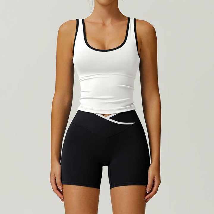Women's sculpting activewear set with high-waist shorts & sports bra. Perfect for gym workouts & yoga.