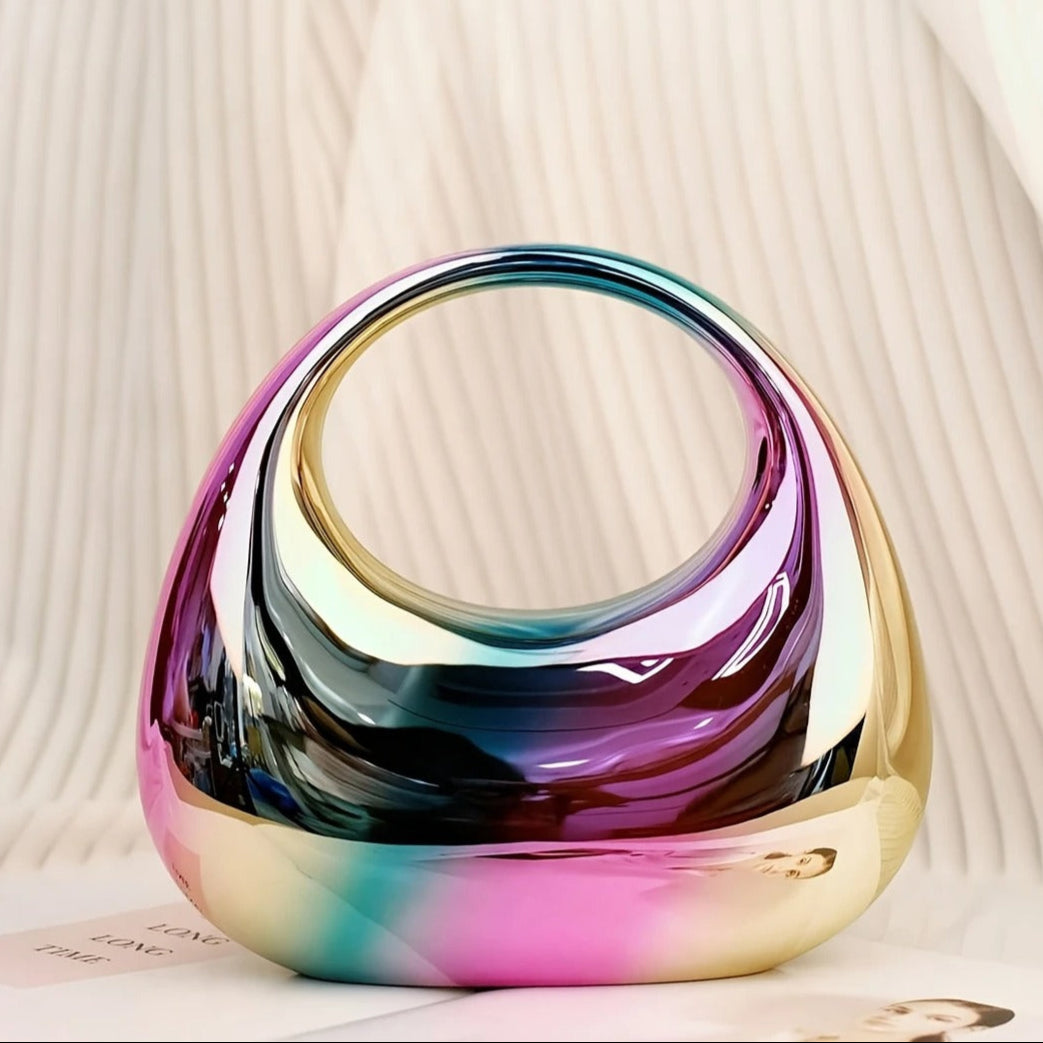 Ladies' sculptural acrylic party clutch, a fashionable and modern design.
