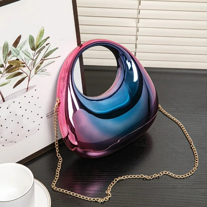 Sculptural acrylic shoulder bag, women's chic accessory with glossy finish.