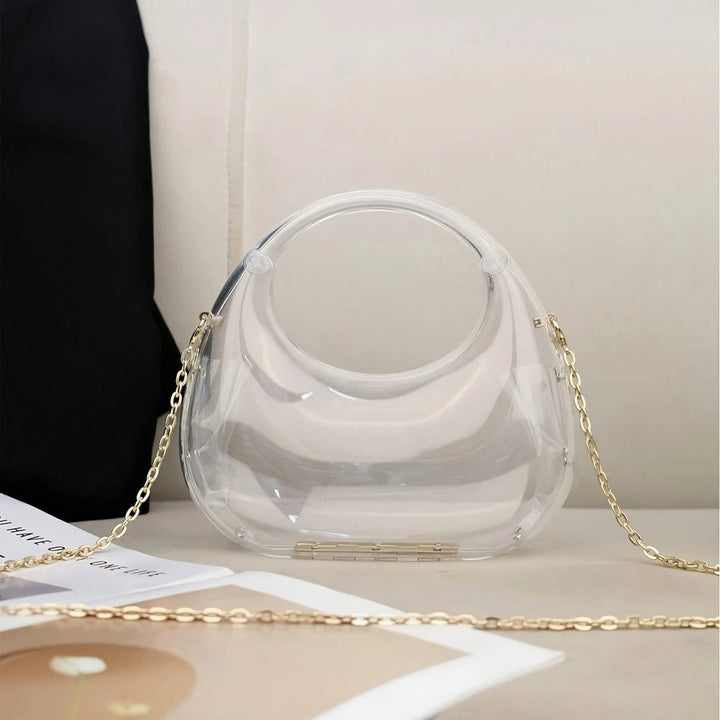 Women's sculptural acrylic clutch, a sleek and stylish party bag.