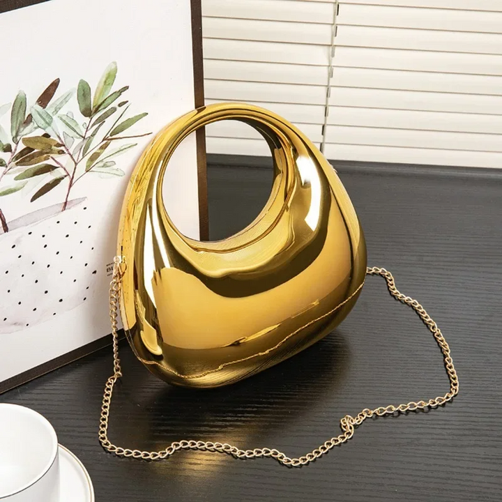 Fashionable sculptural acrylic shoulder bag for women, a true statement piece.
