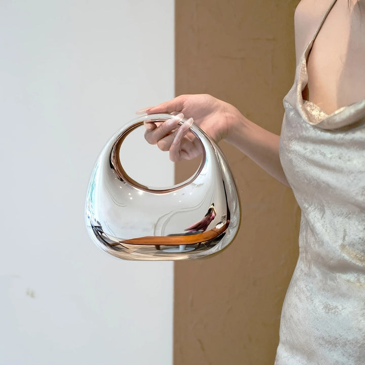 Sculptural women's acrylic handbag, ideal as an evening or party accessory.