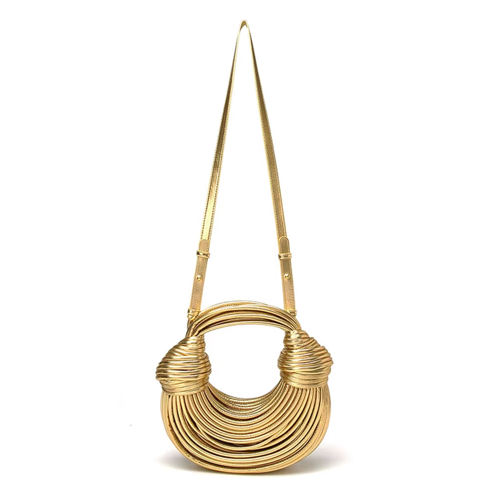 Vegan leather shoulder & crossbody bag for women, a modern sculptural design statement.