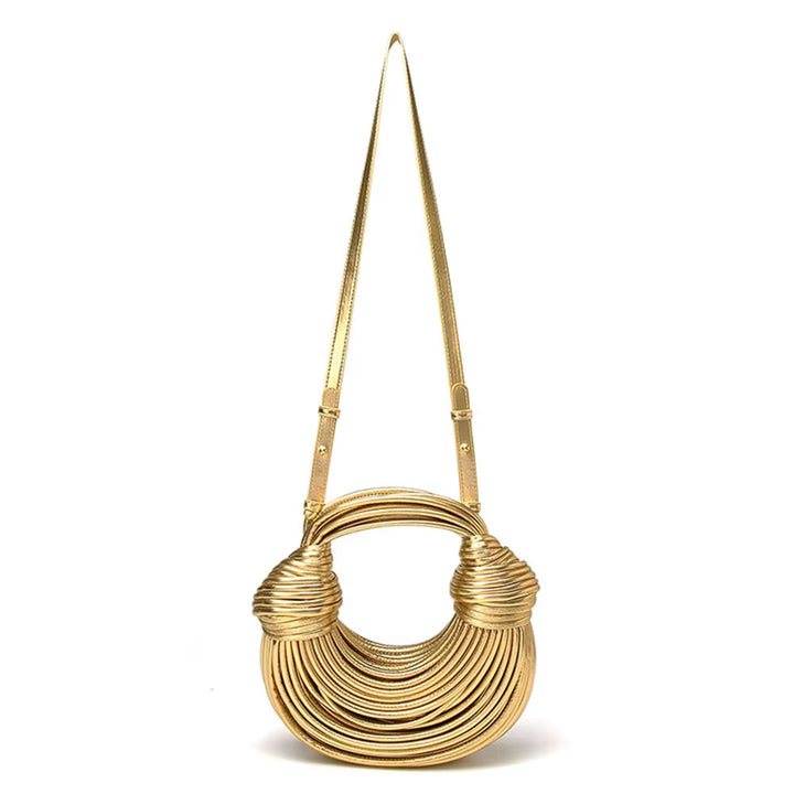 Vegan leather shoulder & crossbody bag for women, a modern sculptural design statement.