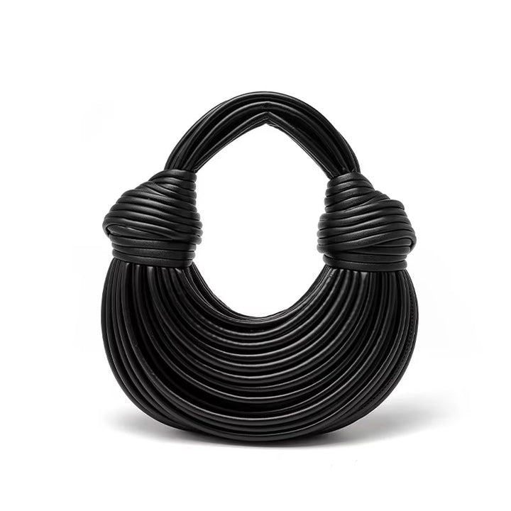 Detachable strap vegan leather handbag; sculptural women's shoulder & crossbody bag design.