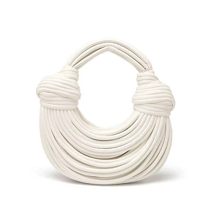 Stylish women's sculptural handbag crafted from vegan leather, with a versatile detachable strap.