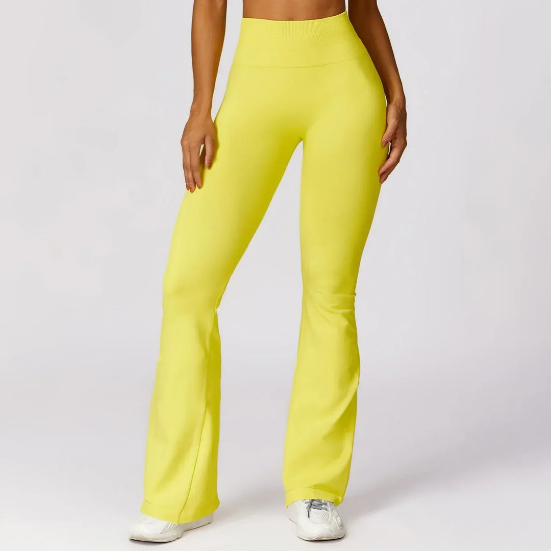 Flattering women's seamless flared yoga leggings, enhancing comfort & movement.