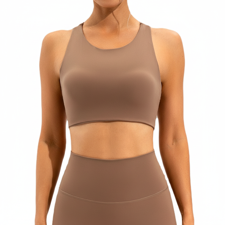 Modern women's seamless gym top, stylish and comfortable fitness apparel for training.