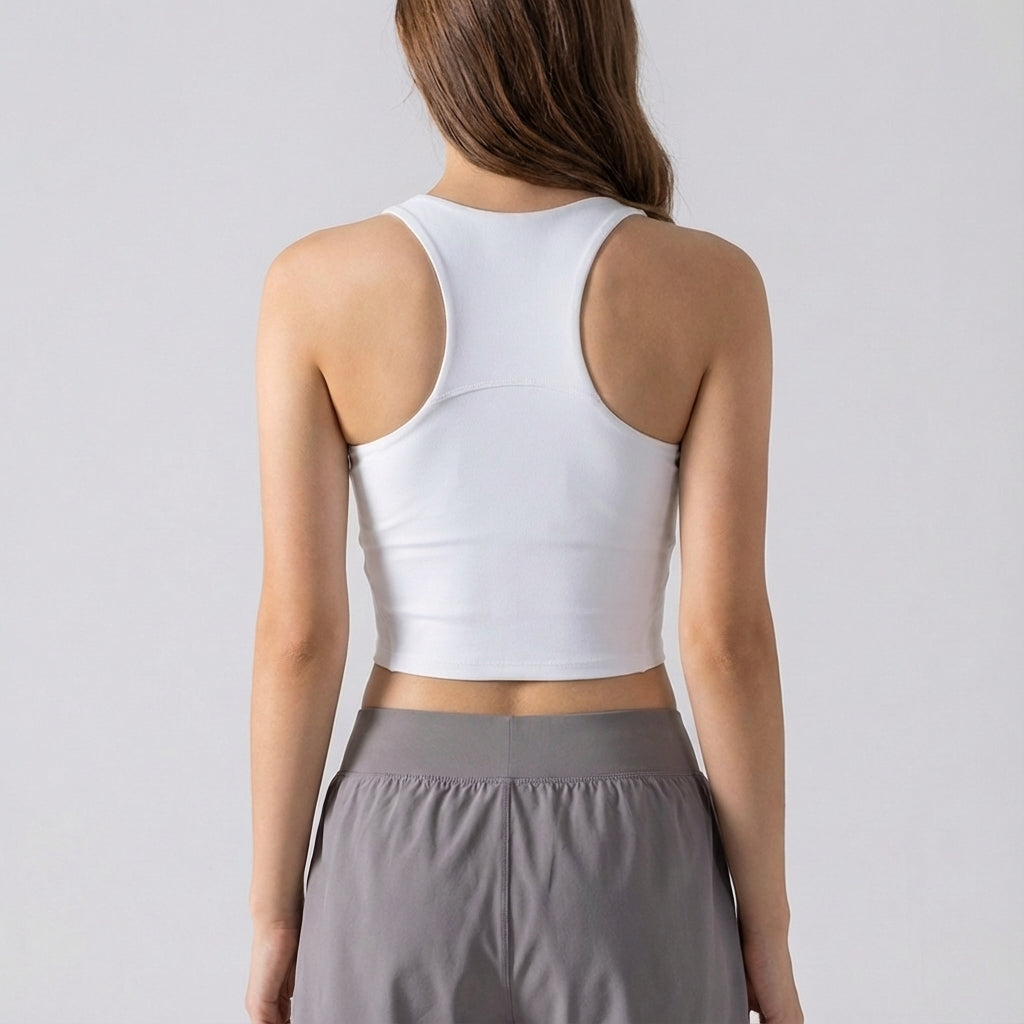 Trendy women's gym wear, short cut seamless sports top in black, perfect for active lifestyles.