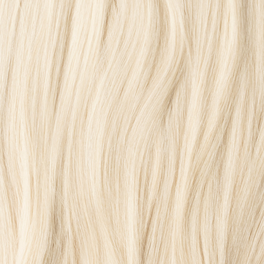 Invisible seamless weft hair extensions, Light Ash Blonde 60B, for natural-looking volume & hair lengthening.