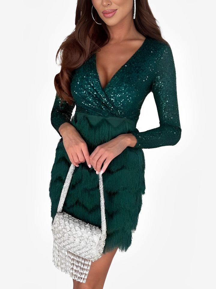 Elegant women's wrap mini dress with sequin & fringe detail, long sleeves, great for formal parties.