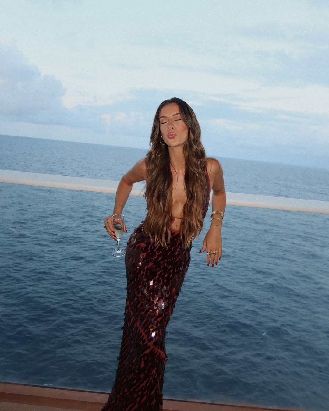 Long sleeveless sequin gown for women, with a chic plunge neckline. Stunning for homecoming, prom, or evening wear.