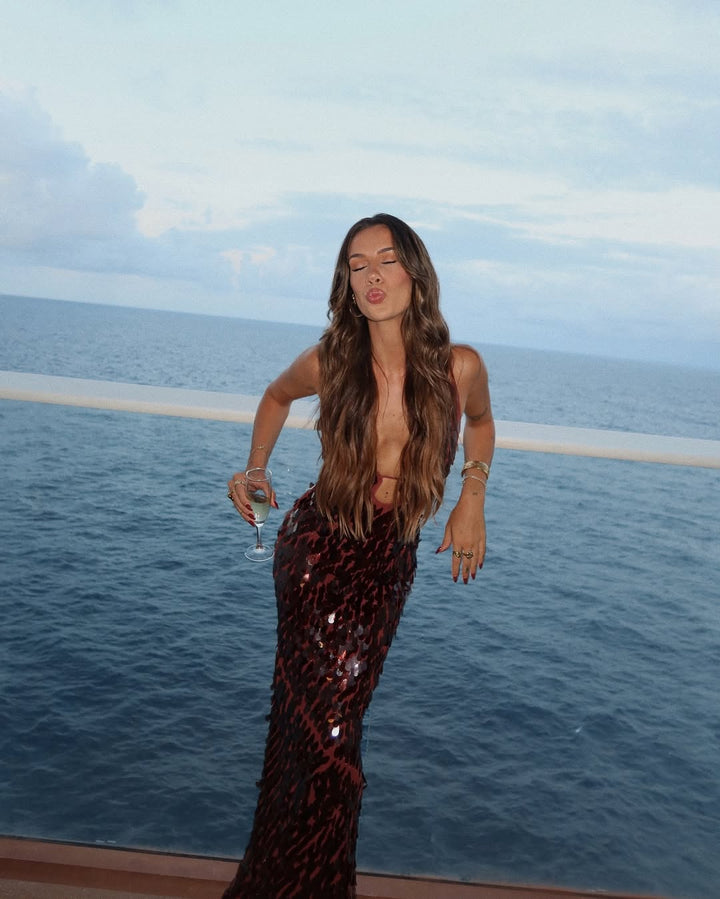 Long sleeveless sequin gown for women, with a chic plunge neckline. Stunning for homecoming, prom, or evening wear.
