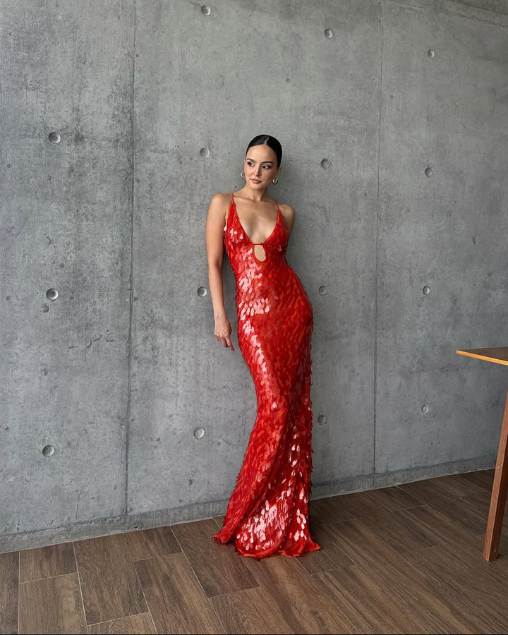 Glamorous women's sequin maxi dress with a flattering plunge neck. An eye-catching choice for any formal event.