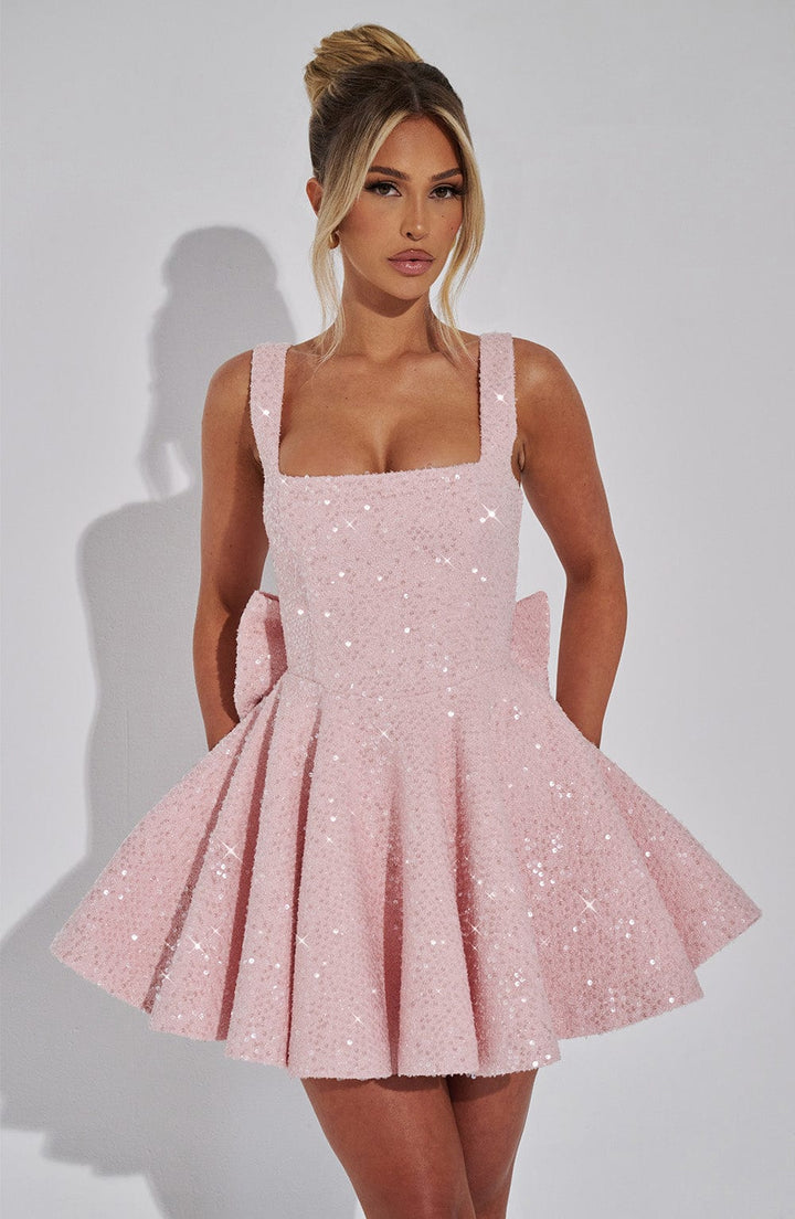 Elegant women's homecoming skater dress with sequins and a bow, a stunning party and dance dress.
