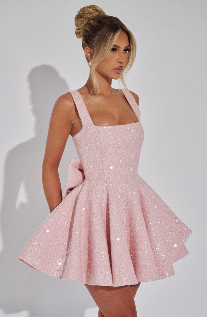 White sequin skater party dress for women with a charming bow, ideal for homecoming or special events.