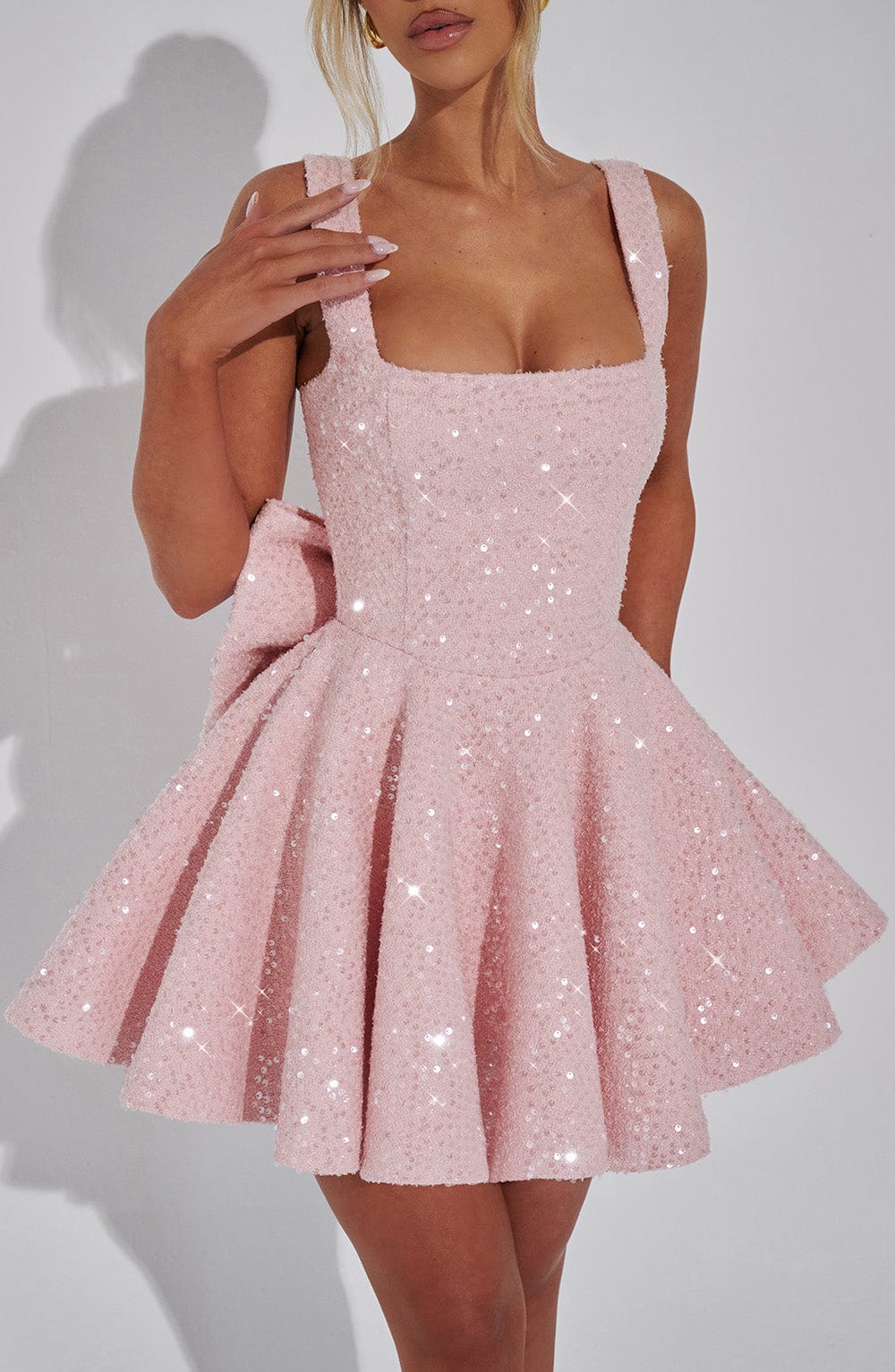 Women's sequin bow skater dress with a beautiful flare skirt, a sparkling choice for homecoming dances.