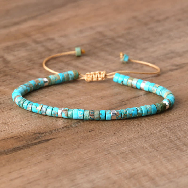 Handmade women's Seraphina bracelet, braided with natural gemstone rollers. Adjustable fit.