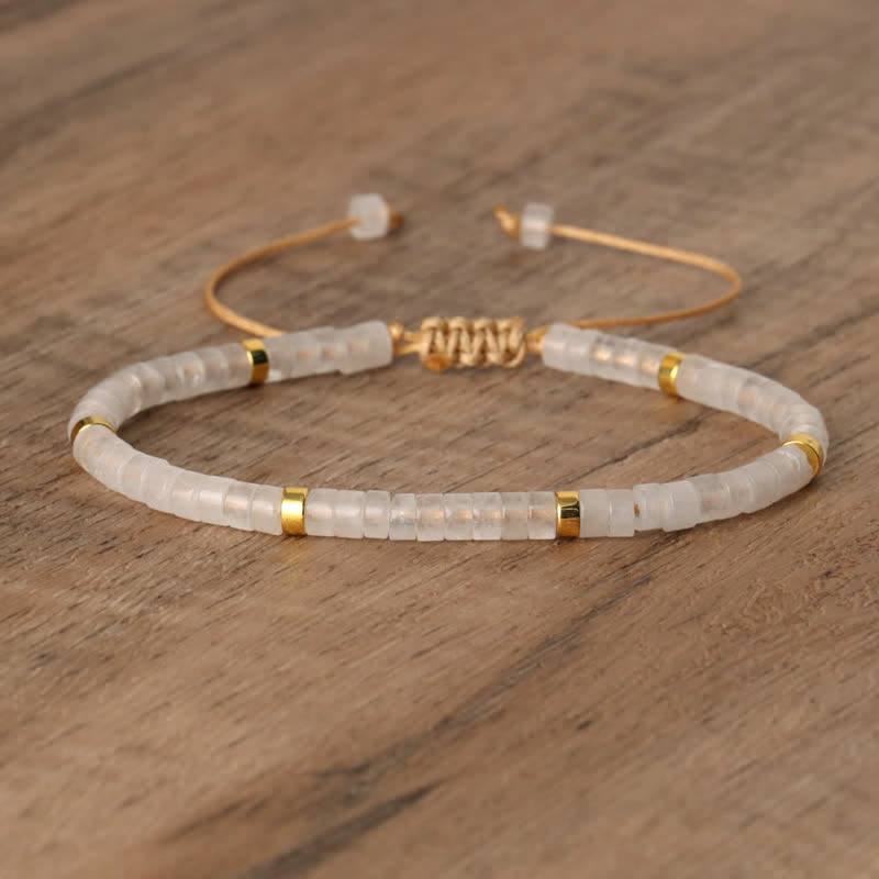 Seraphina women's accessory: braided natural stone roller bracelet, elegant & adjustable.