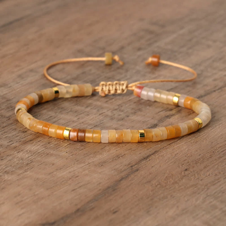Handmade Seraphina braided bracelet with natural stone rollers, perfect for women.