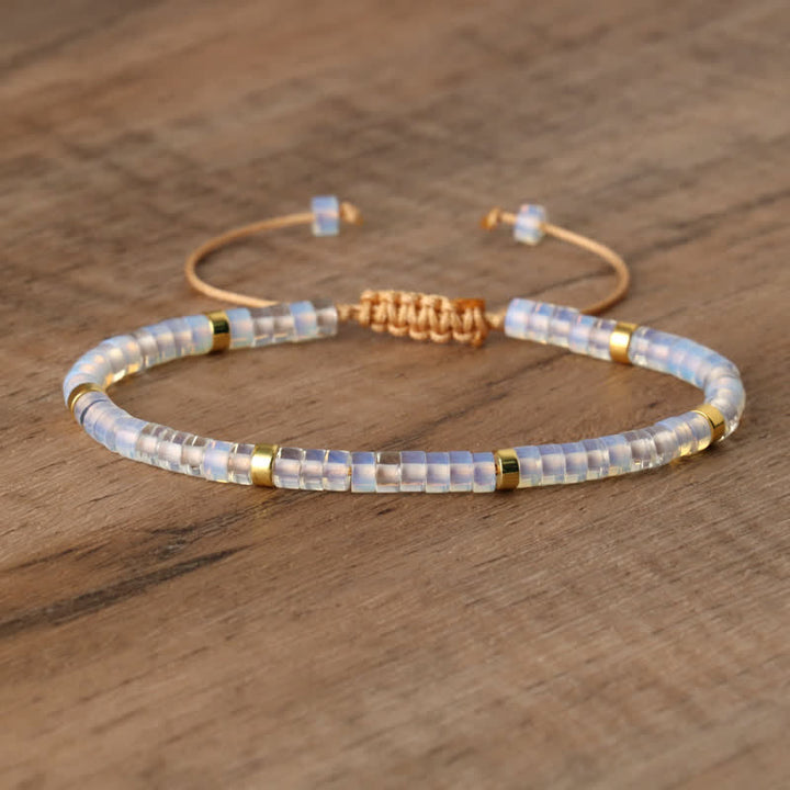 Elegant women's Seraphina bracelet with braided texture & 2.4mm natural stone rollers.