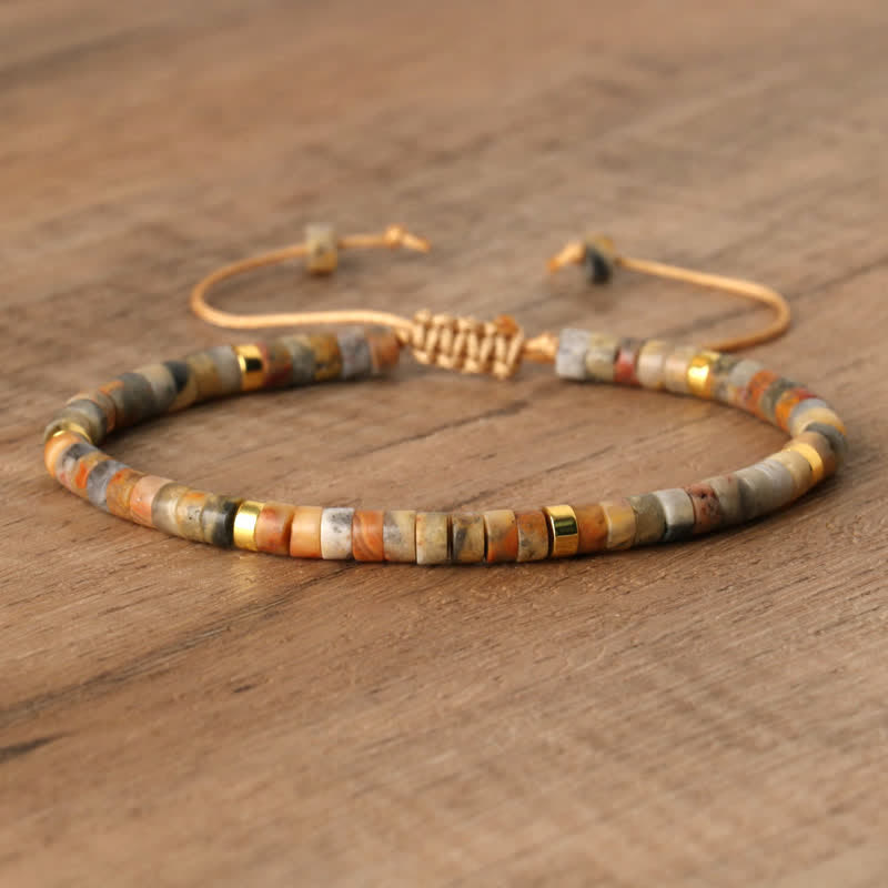 Handmade Seraphina women's braided bracelet with natural stone rollers. A unique piece.