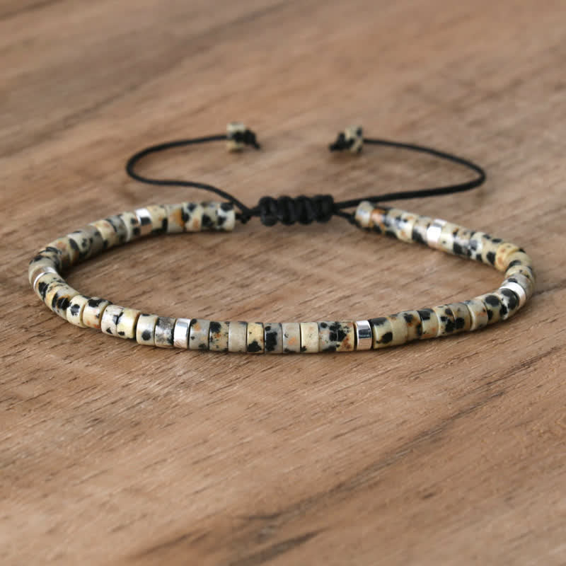 Women's Seraphina braided bracelet with natural stone rollers. Handmade & chic.