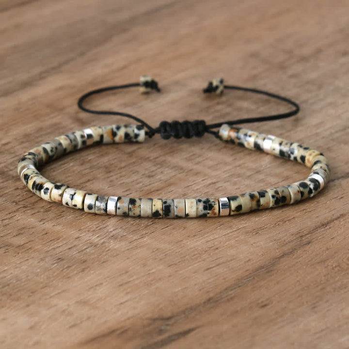 Women's Seraphina braided bracelet with natural stone rollers. Handmade & chic.