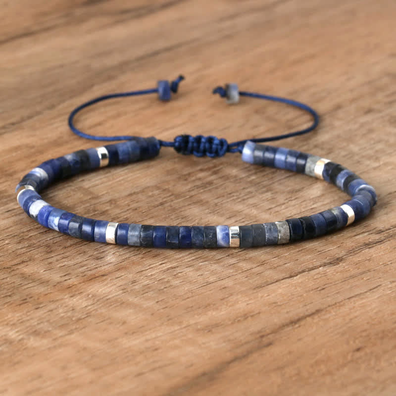Elegant Seraphina women's bracelet with braided pattern & natural stone rollers.