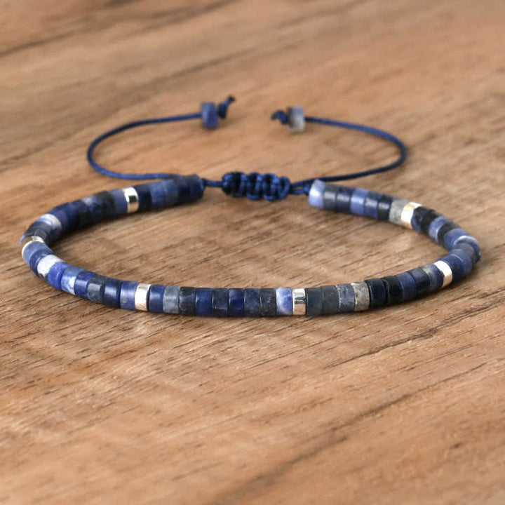 Elegant Seraphina women's bracelet with braided pattern & natural stone rollers.