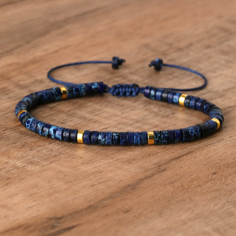 Spiritual Seraphina women's braided bracelet, featuring natural healing gemstone rollers.