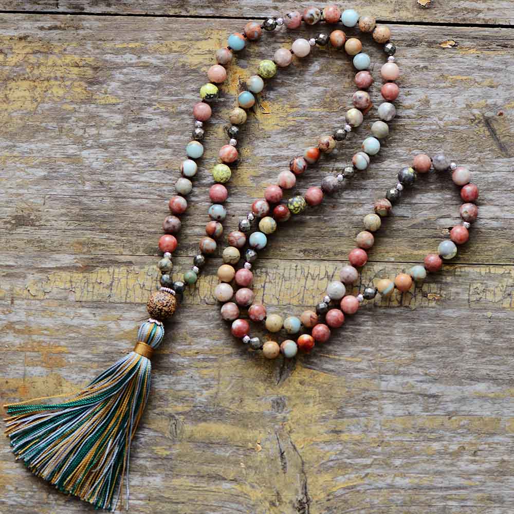 Women's Seraphina rhodonite & hematite mala necklace for heart-strengthening, meditation, and spiritual healing.