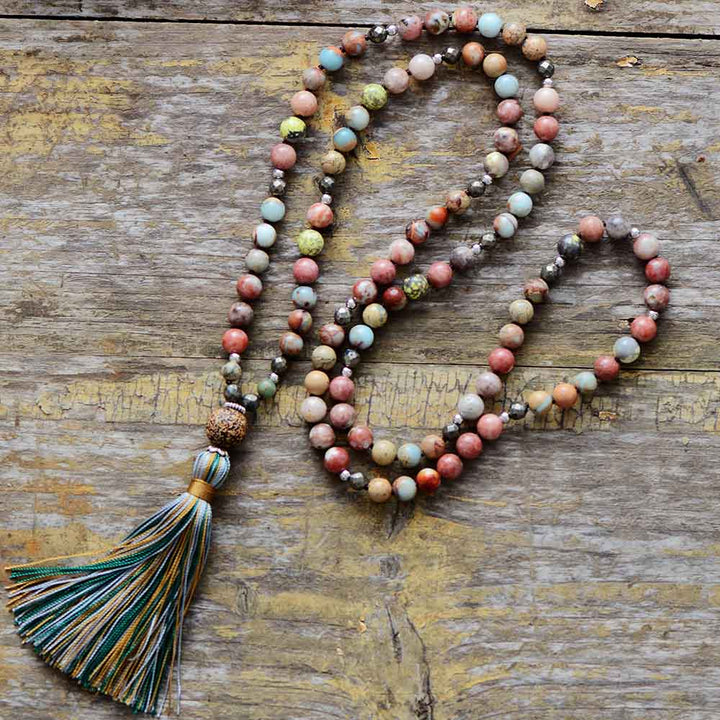 Women's Seraphina rhodonite & hematite mala necklace for heart-strengthening, meditation, and spiritual healing.