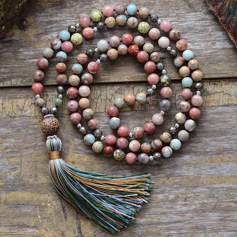 Elegant women's rhodonite & hematite mala necklace, a spiritual healing gemstone jewelry for yoga & meditation.