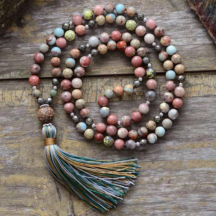 Elegant women's rhodonite & hematite mala necklace, a spiritual healing gemstone jewelry for yoga & meditation.