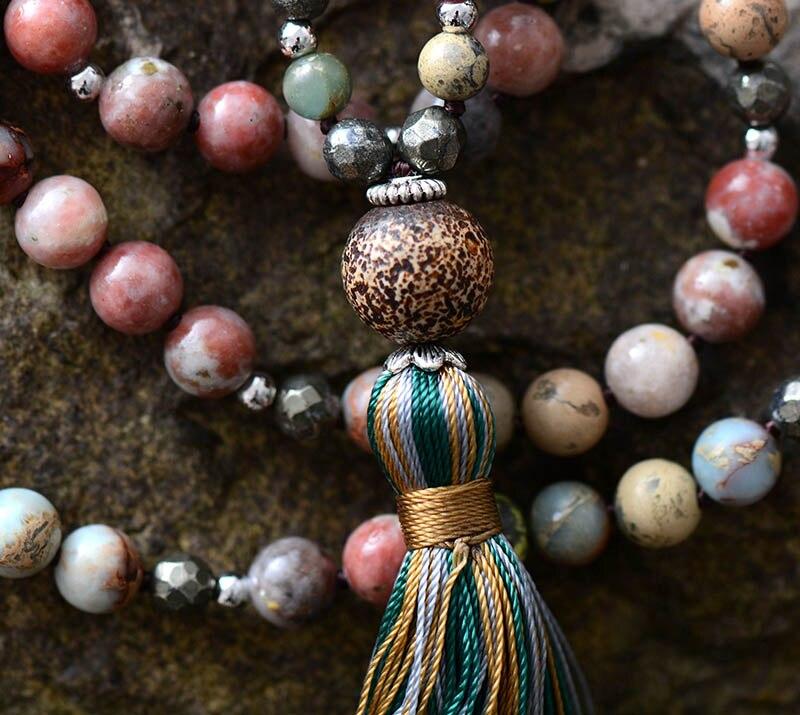 Healing women's mala necklace with rhodonite & hematite gemstones, ideal for meditation, yoga, or spiritual wear.