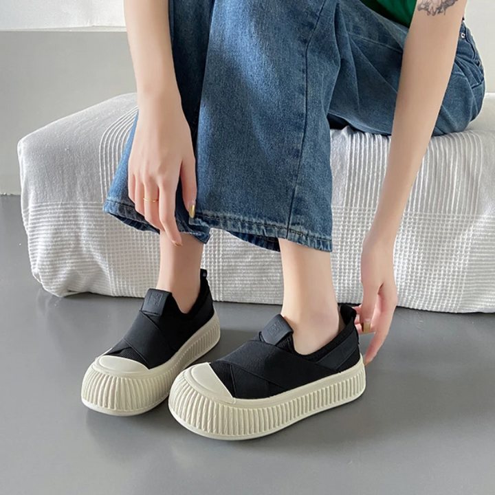 Comfortable Seraphine white platform slip-on sneakers, great for casual walking.