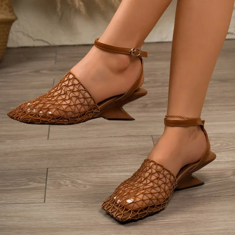 Fashionable Serelva Meshform evening heels, brown, with a unique sculpted heel and pointed toe.