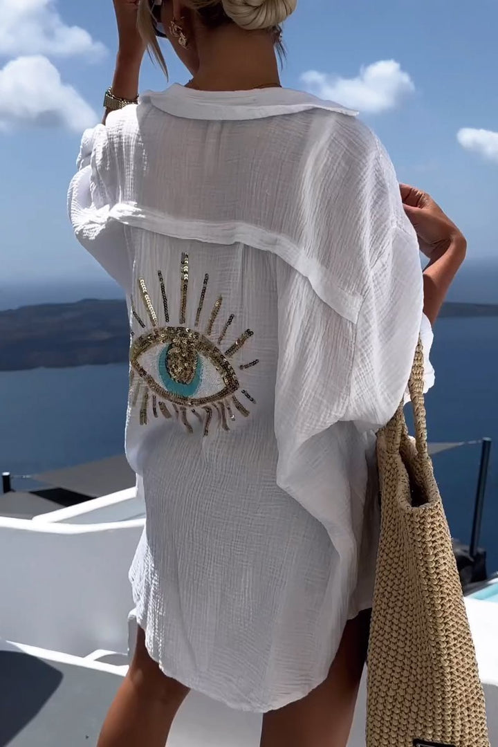 Women's Serena summer tunic with V-neck, long sleeves, and flowy lightweight fabric, ideal for casual chic.