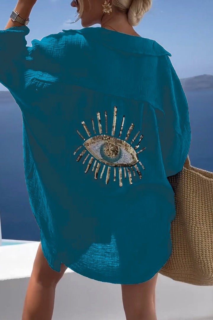 Model wearing the Serena women's summer tunic, a comfortable and chic long-sleeve top for elegant style.