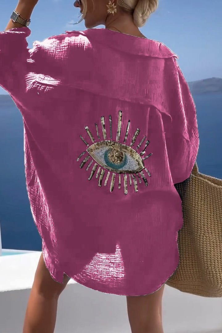 Full back view of the Serena women's long-sleeve summer tunic, highlighting the elegant embellished design.