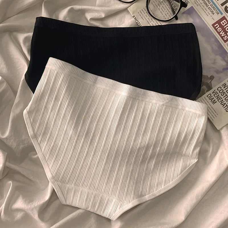 Close-up of soft ribbed cotton fabric on Serene women's high-rise panties. Breathable 3-pack underwear.
