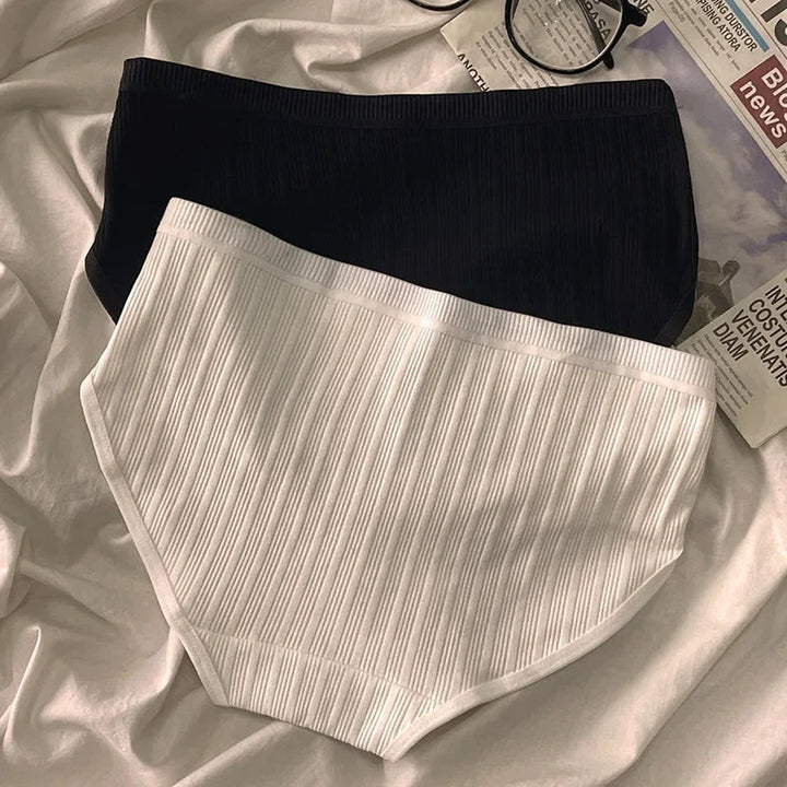 Close-up of soft ribbed cotton fabric on Serene women's high-rise panties. Breathable 3-pack underwear.