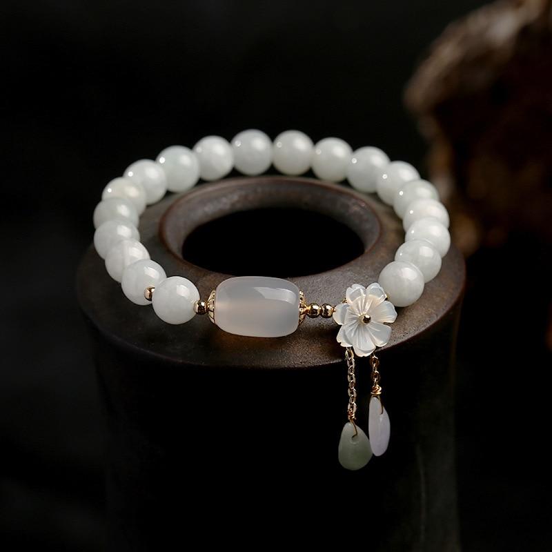 Women's Serenity Jade Crystal Bracelet with polished green jade and white agate beads, elegant healing stones
