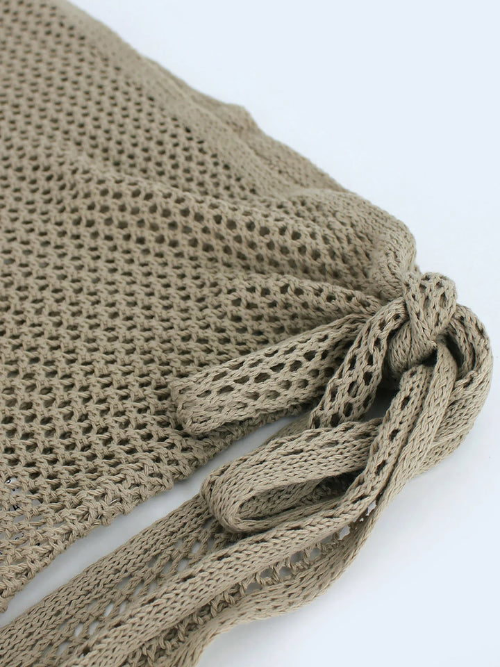 Adjustable women's mesh wrap skirt cover up. Ideal for swimwear, sheer summer fashion.
