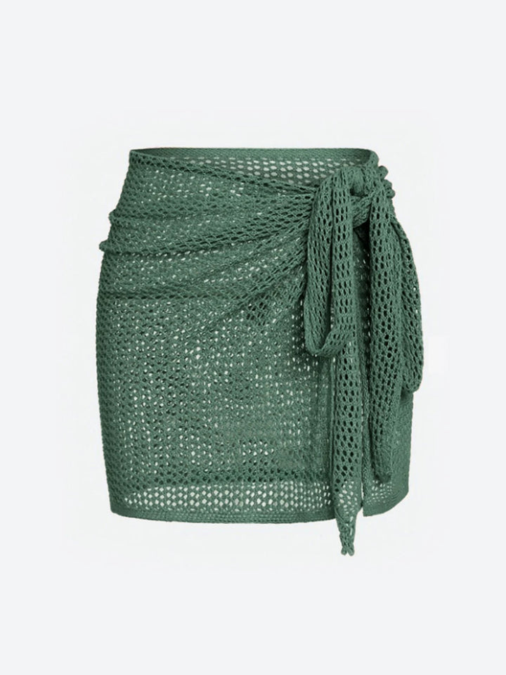 Stylish high-slit mesh swim skirt cover up. Women's versatile beachwear essential.